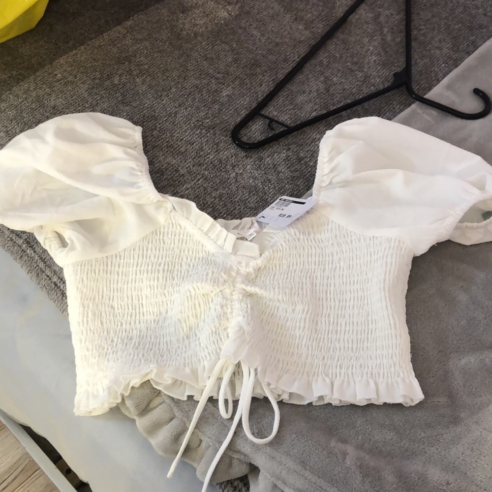 White off the shoulder crop top.